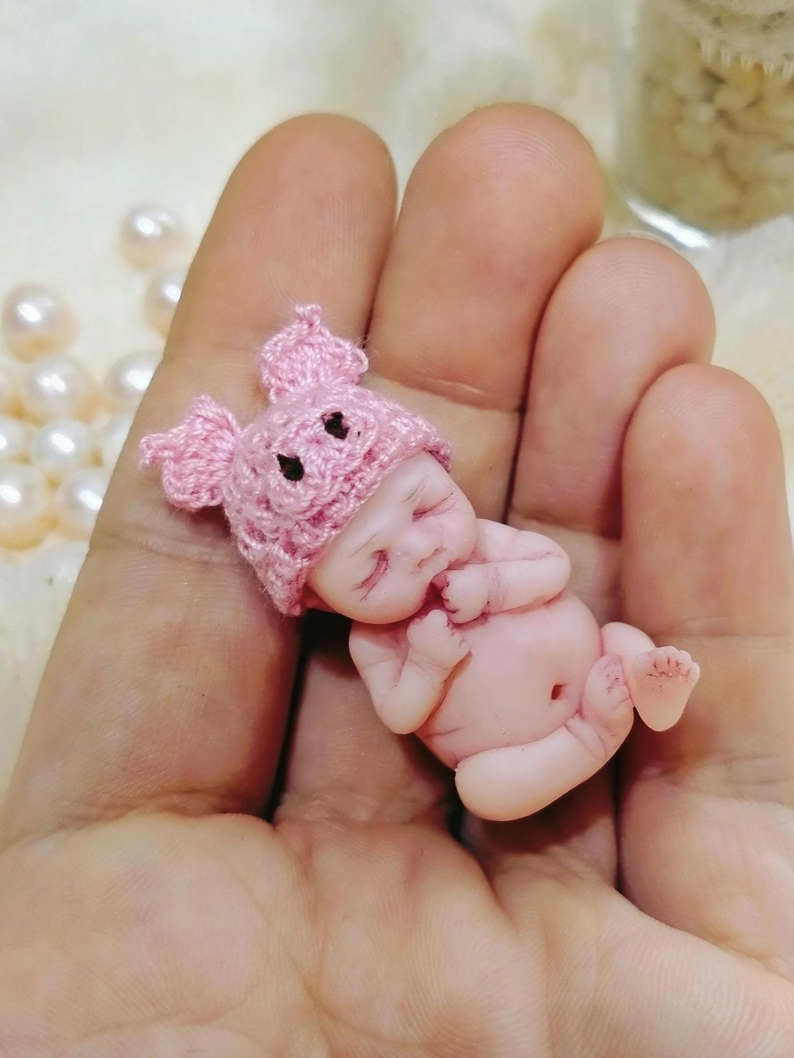 Digital PDF tutorial for sculpting a 1:12 scale OOAK polymer clay baby doll with step-by-step instructions and micro teddy bear hat pattern.