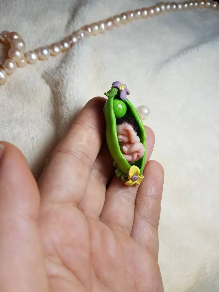 Creative OOAK miniature baby doll nestled in green pea pod with felt peas and purple flower accents - by Mini Baby Dolls